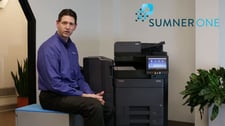 Man with Kyocera printer