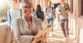 Education clipboard, students and portrait of teacher happy on college campus for coaching, teaching and learning. Knowledge study, high school principal or university professor with daily checklist