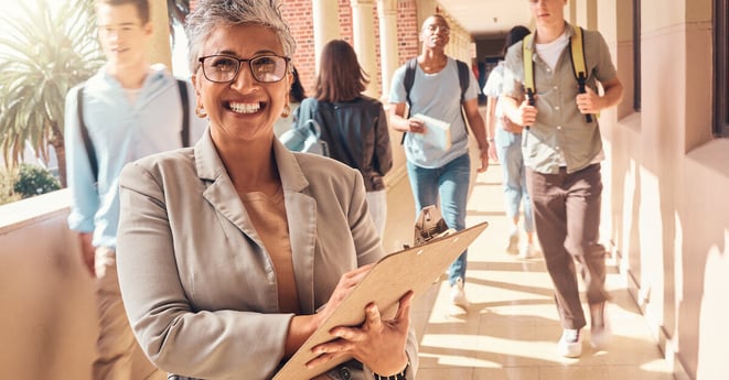 Education clipboard, students and portrait of teacher happy on college campus for coaching, teaching and learning. Knowledge study, high school principal or university professor with daily checklist