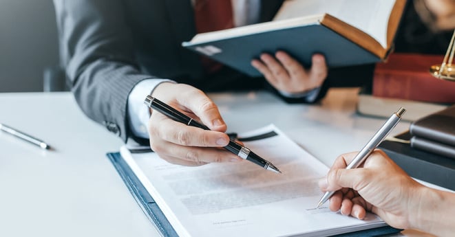 Businessman and lawyer discuss the contract document. Treaty of the law. Sign a contract business.