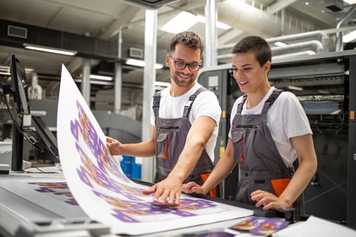Employees of a Commercial Print Shop That Offers Specialty Printing Services