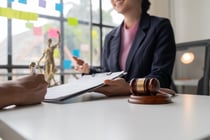 Businessman with lawyer discussing law firm business plan - Market Analysis Summary