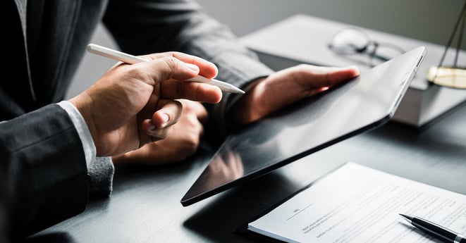 Close up of businessman or lawyers discussing about contract or business agreement at law firm office, business people making deal document legal, law and justice advice service concept.