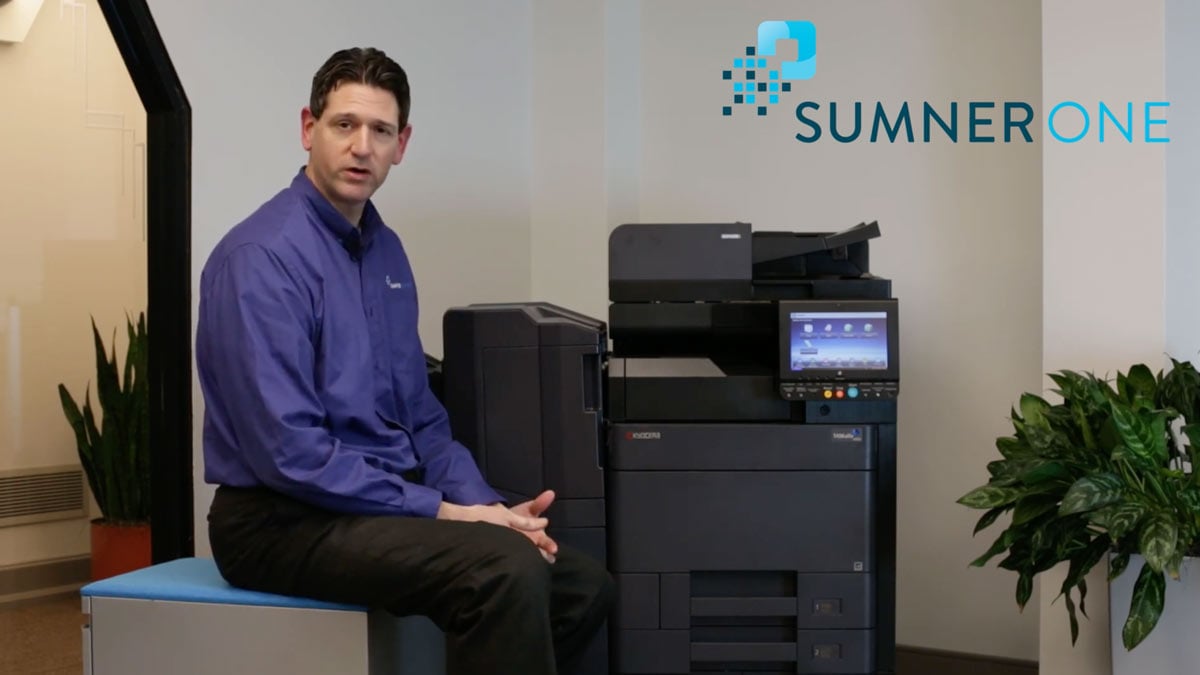 Man with Kyocera printer