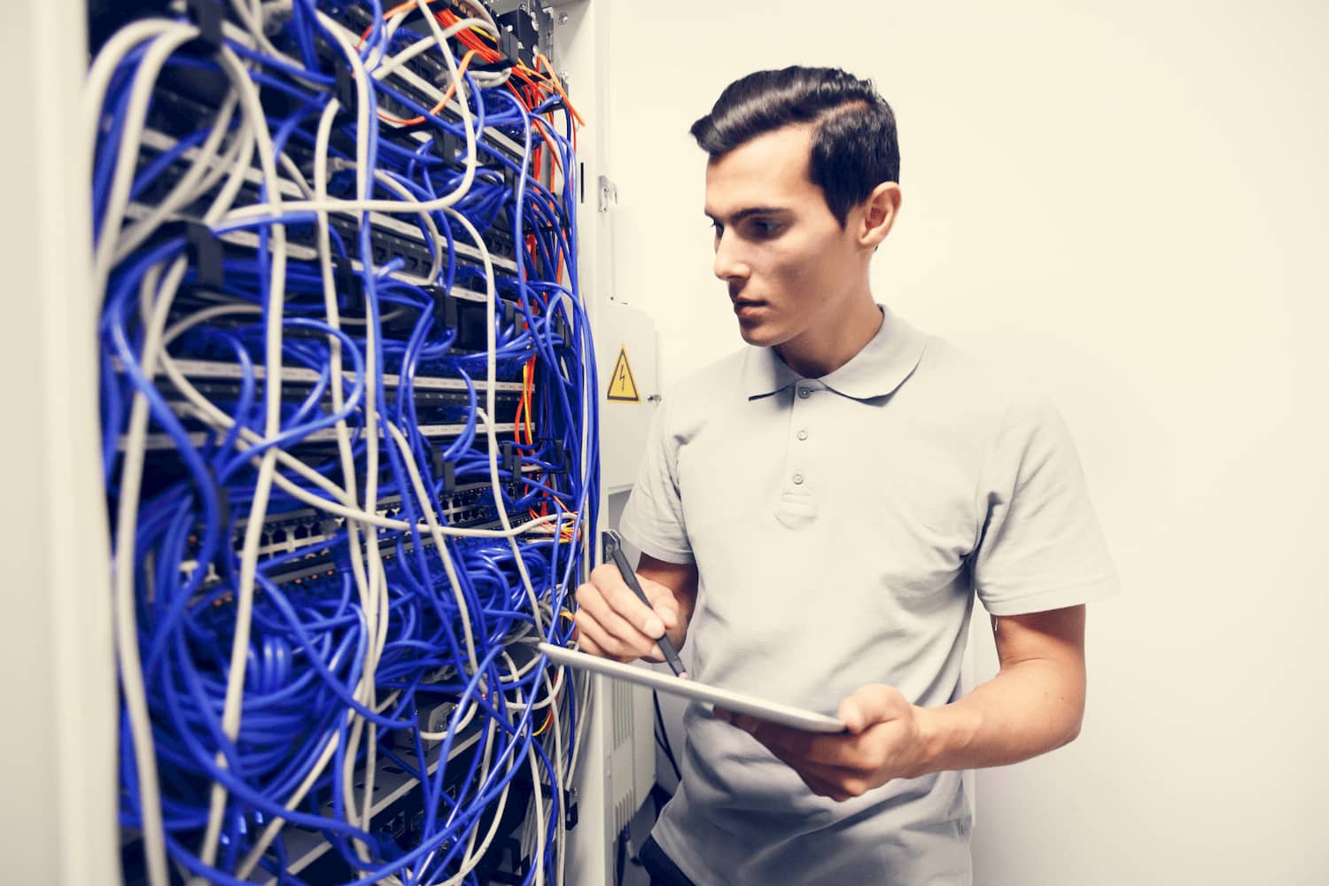 IT-engineer-working-on-a-server-rack
