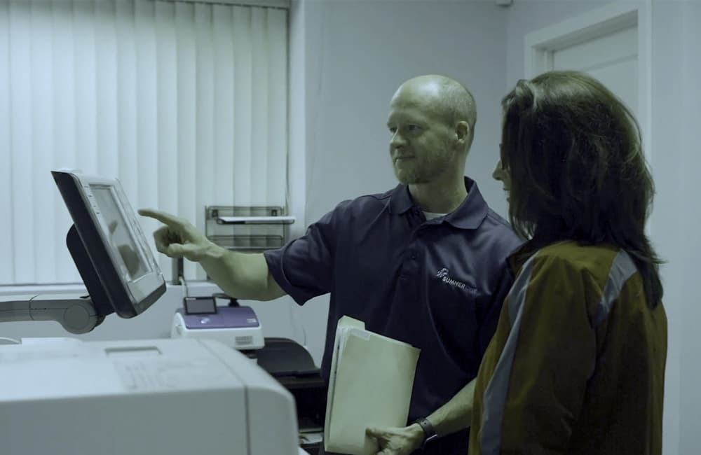 SumnerOne-Service-Technician-Helping-a-Customer (1)