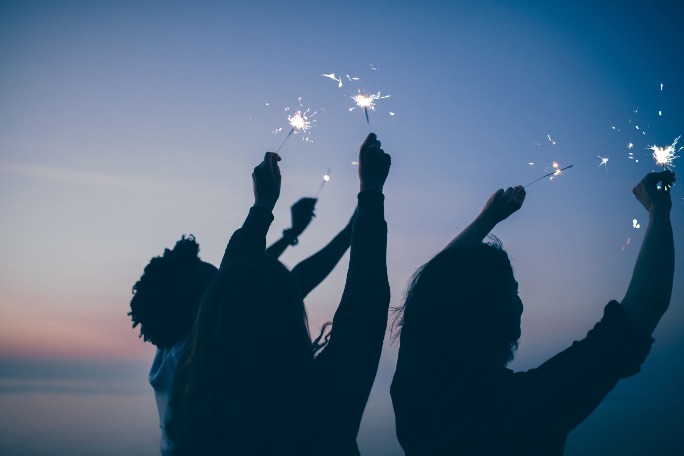 fireworks-over-america-case-study-people-hold-sparklers